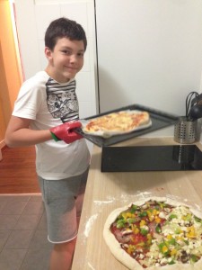 Alex made his first ever pizza...from dough to delicious!!!